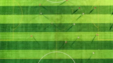 Futbol sahasında futbol oynayan atletlerin hava manzarası.