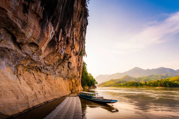Mekong river at sunset. Sunset Cruise is a slow-boat cruise along the Mekong river and is one of the most famous tourist attractions of Luang Prabang