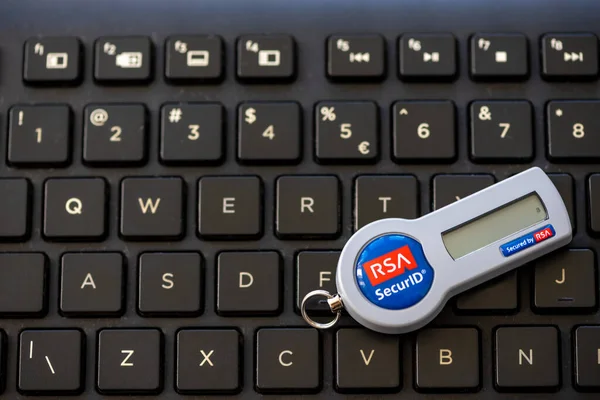 Timisoara, Romania - June 20, 2021: Close-up on a RSA SecurID token on a black keyboard, SID700