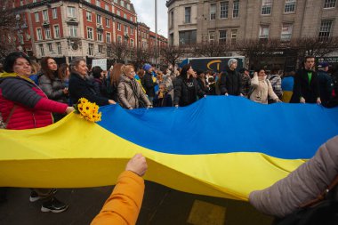 Dublin, Co. Dublin, Ireland - February 24th 2023 - Ukrainians and supporters rally. The first anniversary of Russia's invasion of Ukraine. O'Connell street near GPO