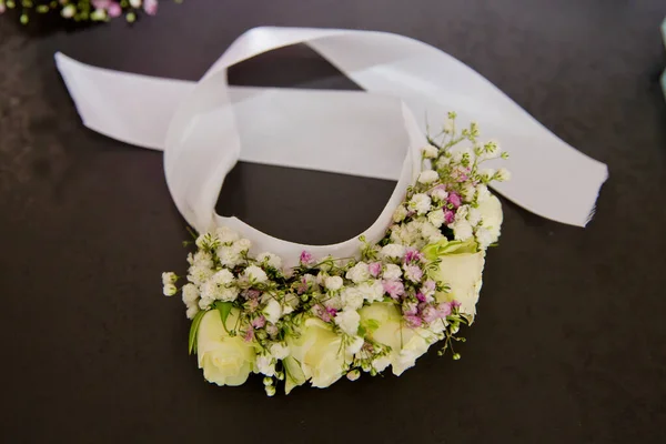 Flower headband for bridesmaid. Selective focus.