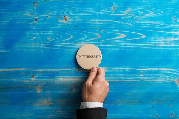 Male Hand Business Suit Placing Wooden Cut Circle Internship Word — Stock Photo, Image