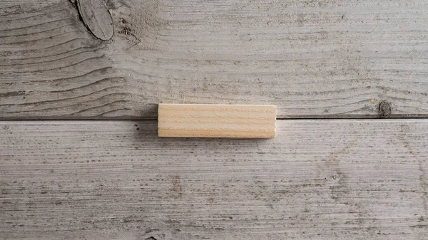 Plain Simple Blank Wooden Peg Placed Textured White Wooden Background — Stock Photo, Image