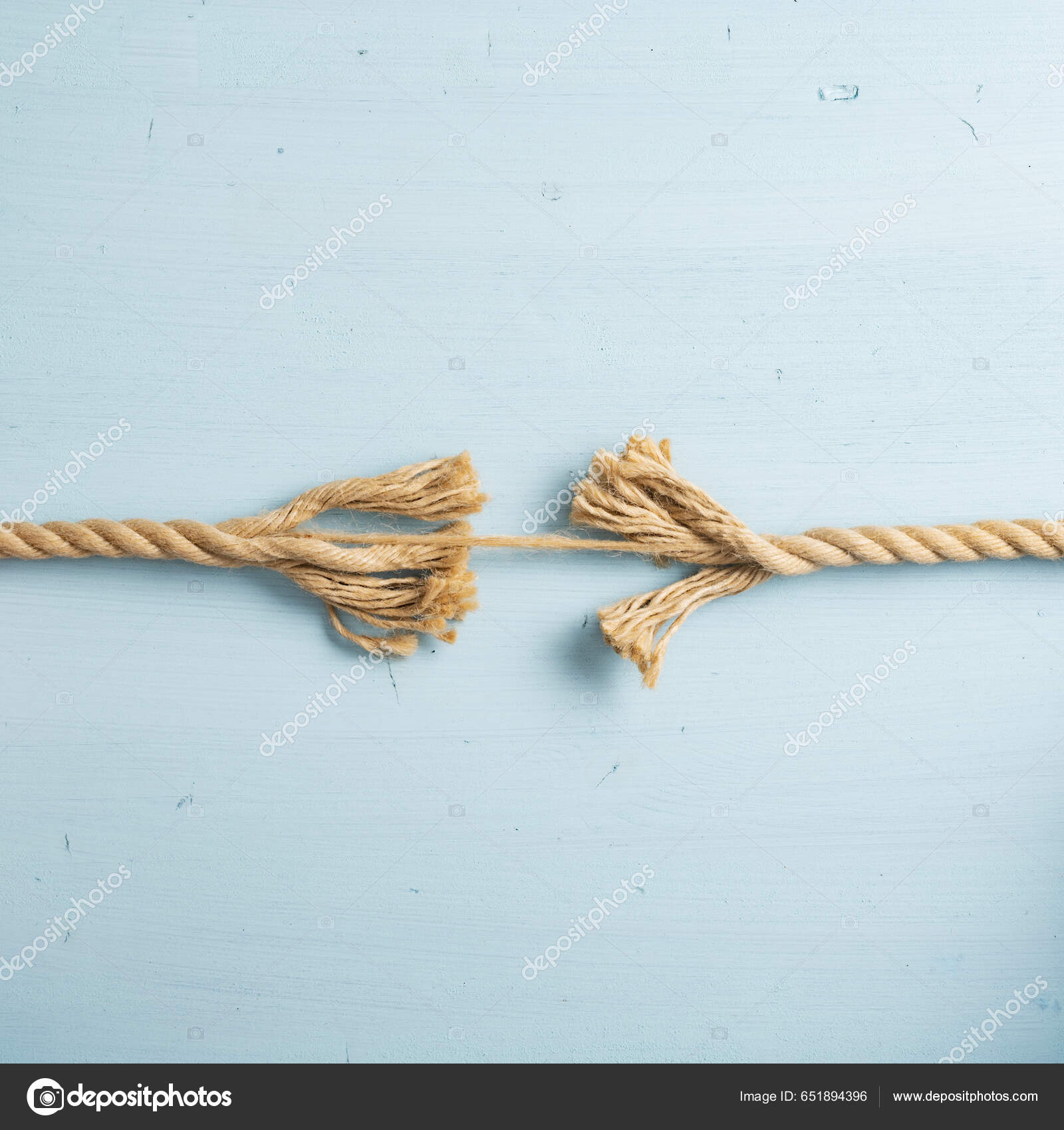 Rope Tearing Apart Just Small String Still Attached Blue Background Stock  Photo by ©Gajus-Images 651894396