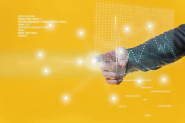 男性的手演示虚拟接口与财务图表和二进制代码数字闪烁着黄色背景 — 图库照片