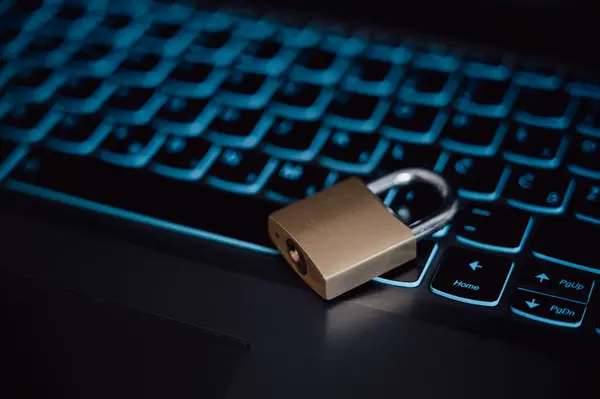 Golden Locked Padlock Lying Black Laptop Computer Keyboard Conceptual Image Stock Picture