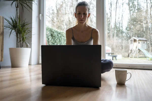 Young Woman Freelancer Sitting Her Living Room Floor Working Laptop Stock Photo