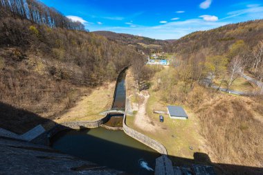 Beautiful landscape seen from top of Bystrzyca water dam to Bystrzyca river at sunny morning