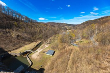 Beautiful landscape seen from top of Bystrzyca water dam to Bystrzyca river at sunny morning