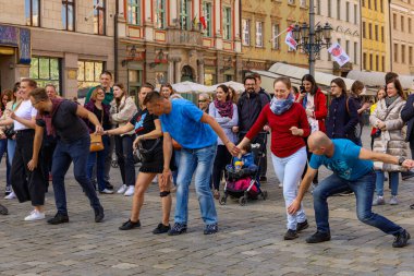 Wroclaw, Poland - April 2022: Rueda de Casino open event at market square