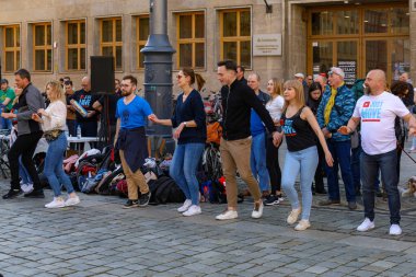 Wroclaw, Poland - April 2022: Rueda de Casino open event at market square