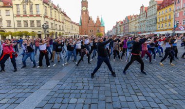 Wroclaw, Poland - April 2022: A lot of people dancing Rueda de Casino open event at market square