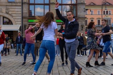 Wroclaw, Poland - April 2022: A lot of people dancing Rueda de Casino open event at market square