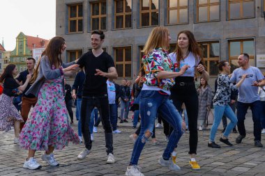 Wroclaw, Poland - April 2022: A lot of people dancing Rueda de Casino open event at market square