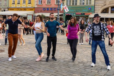 Wroclaw, Poland - April 2022: A lot of people dancing Rueda de Casino open event at market square