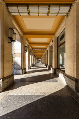 Wroclaw, Poland - May 2022: Sun Light and shadows in tunnel of Arkady Wroclawskie