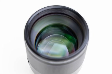 Wroclaw, Poland - December 19 2023: Camera lens for mirrorless Canon camera with RF mount Viltrox RF 85mm f1.8 STM on white background clipart