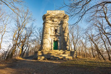 Sobotka, Poland - January 29 2024: High concrete tower on top of Wiezyca mountain in Sleza massif at sunny morning clipart