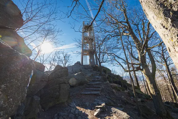 stock image Sobotka, Poland - January 29 2024: High viewing tower on top of Sleza mountain with beautiful landscapes around at sunny morning