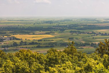 Panoramic View of a Scenic Countryside Under a Blue Sky clipart