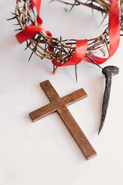 Jesus Crown Thorns and nails and cross on a white background. Crucifixion Of Jesus Christ. Passion Of Jesus Christ. Concept for faith, spirituality and religion. Easter Day
