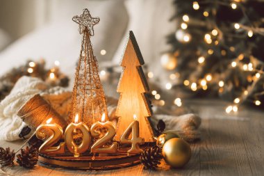 Happy New Years 2024. Christmas background with Christmas tree, cones and Christmas decorations. Christmas holiday celebration. New Year concept. clipart