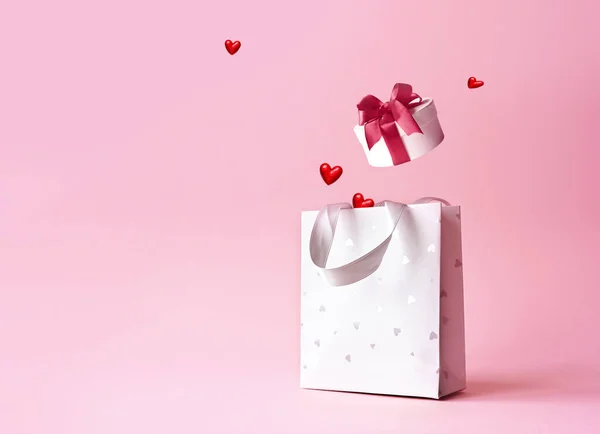 Bevásárlótáska Ajándékdobozzal Rózsaszín Hátterű Szívekkel Szent Valentin Napi Vásárlás Kedvezmények — Stock Fotó