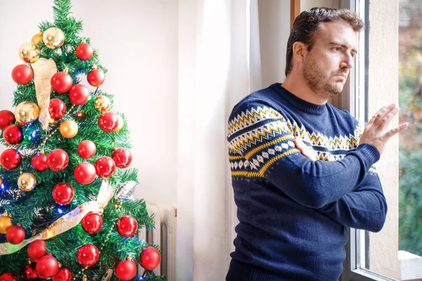 stock image Man suffering negative emotions during christmas day