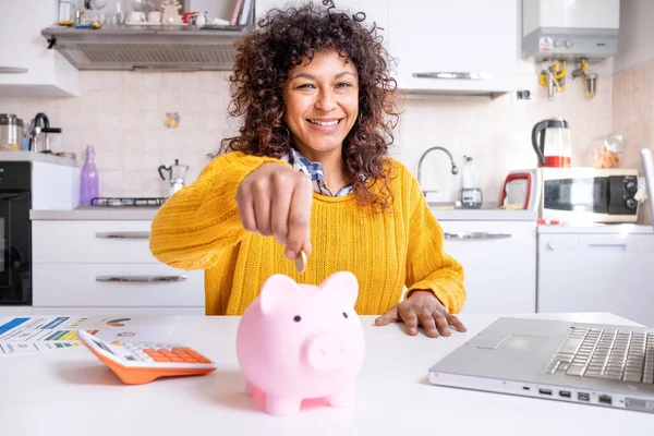 Cheerful Black Woman Saving Money Future Looking Camera 图库图片