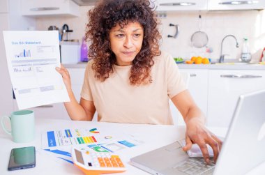 Black woman shocked by high energy home cost and bills