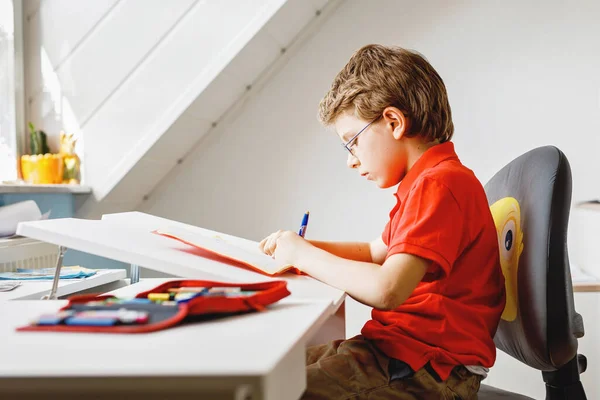 Portrait Little Kid Boy Glasses Home Making Homework Writing Learning — стоковое фото