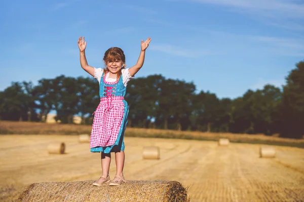 Cute Little Kid Girl Traditional Bavarian Costume Wheat Field Happy — Zdjęcie stockowe