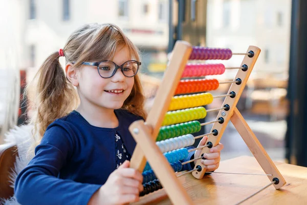 Little Preschool Girl Playing Educational Wooden Rainbow Toy Counter Abacus — Stock Photo, Image