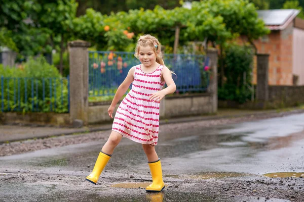 Happy Little Preschool Girl Wearing Yellow Rain Boots Walking Puddles — Stock Photo, Image