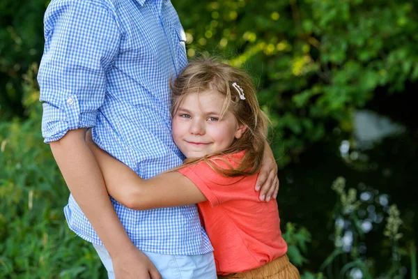 Upset Little Girl Finds Comfort Embrace Her Caring Teenage Brother — Stock Photo, Image