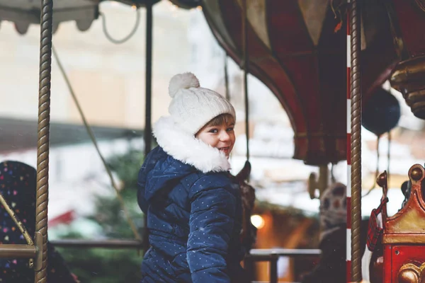 Little Preschool Girl Riding Merry Carousel Horse Christmas Funfair Market — Stock Photo, Image