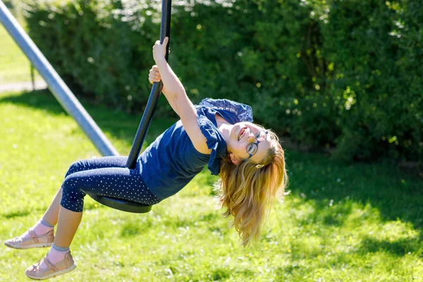Happy Kid Girl Rids Zip Line Swing Outdoor Game Play — Stock Photo, Image