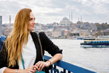 Woman travel in Istanbul near Hagia Sophia famous islamic Landmark mosque, Travel to Istanbul, Turkey background