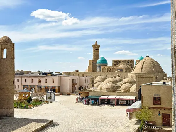 stock image Bukhara, Uzbekistan Aerial view of Kalan Minaret Emir and Alim Khan madrasah of Po-i-Kalan - islamic religious complex