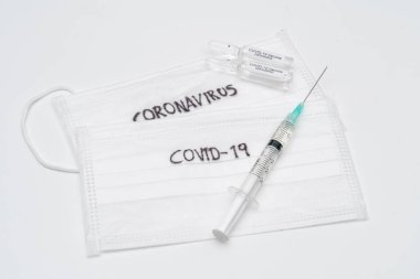 COVID 19 Coronavirus aşısı ve şırınga enjeksiyonu COVID-19 'dan korunma, aşılama ve tedavi için kullanılır