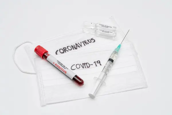 stock image COVID 19 Coronavirus, infected blood sample in the sample tube, Vaccine and syringe injection It use for prevention, immunization and treatment from COVID-19