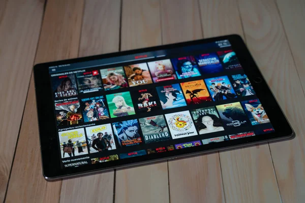 stock image iPad Pro12.9 tablet new product of apple using Netflix, Netflix is a global provider of streaming movies and TV series.