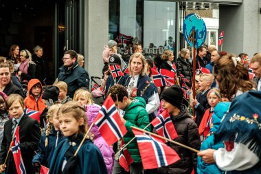 Sandnes, Norway, May 17 2023, Colourful Group Of Men Women And Children Carrying Norwegian Flags Independence Day Parade Sandnes clipart