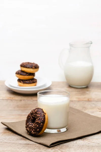 Mini Donuts Covered Chocolate Glaze Served Bottle Jug Glass Milk — Stock Photo, Image