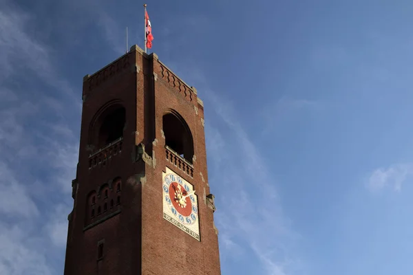 stock image AMSTERDAM, HOLLAND  DECEMBER 10: The Amsterdam stock exchange, with its brick clock tower pictured here, was the first of its kind in the world, dating from the 1600s December 10, 2023 in Amsterdam, Holland