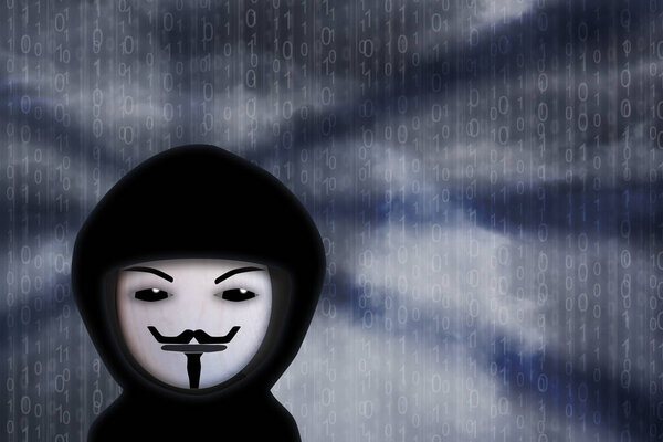 A masked scammer against a dark grey-blue sky. Guy Fawkes mask representation.