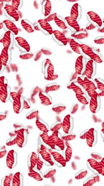 Suşi ton balığı parçaları beyaz arka plana karşı ritmik ve dikey bir hareketle hareketlenerek canlı ve kaprisli bir görsel deneyim yaratır.