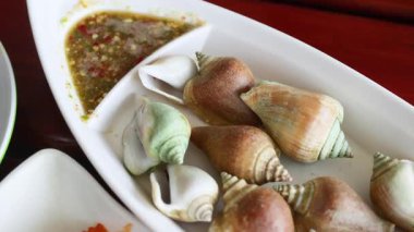 Sos soslu lezzetli deniz ürünleri.