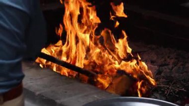 Sequential frames of a fire burning intensely