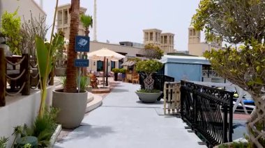 A serene outdoor restaurant with lush greenery